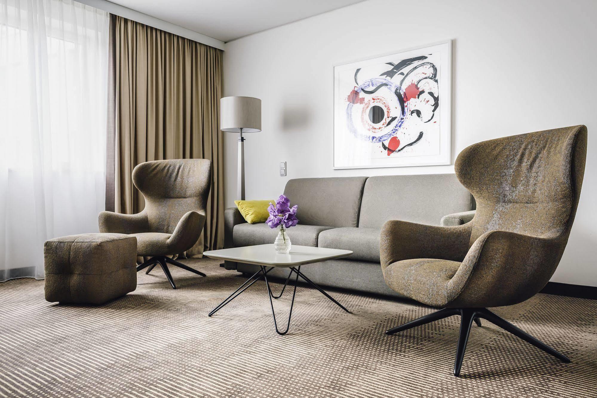 فندق بولمان برلين شفايتزرهوف المظهر الخارجي الصورة Interior of a suite at the Hotel de la Paix